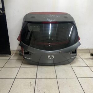 #15,140 MAZDA 2 TAPA CAJUELA